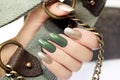 Green silver manicure .