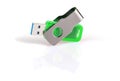 Green and silver USB 3.0 flash drive isolated on white background . USB Pen Drive or flash drive on white background. Close-up. Royalty Free Stock Photo