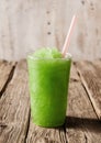 Green Slushie Drink in Plastic Cup with Straw Royalty Free Stock Photo