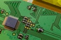 Green small electronic PCB circuit close-up background Royalty Free Stock Photo