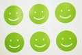 The green smilies on a white background.