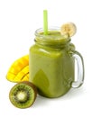 Green smoothie banana kiwi mango in glass jar isolated on white background. Royalty Free Stock Photo