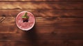 Green Smoothie With Berries And Leaves On Wooden Background