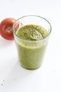 Green smoothie in a glass and red apple. Royalty Free Stock Photo