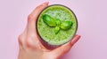 The green smoothie in hand. AI generated Royalty Free Stock Photo