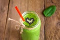 Green smoothie with heart of seeds Royalty Free Stock Photo