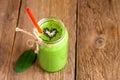 Green smoothie with heart of seeds Royalty Free Stock Photo