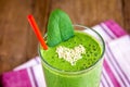 Green smoothie with heart of seeds Royalty Free Stock Photo
