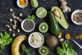 Green smoothie ingredients. Cooking healthy detox smoothies. On a dark background Royalty Free Stock Photo