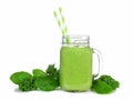 Green smoothie with kale and spinach in a mason jar glass isolated on white Royalty Free Stock Photo