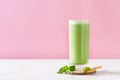 Green smoothie mint or matcha latte in tall glass Royalty Free Stock Photo