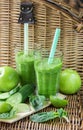 Green smoothie of spinach, Apple, cucumber and lime Royalty Free Stock Photo