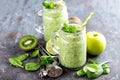 Green smoothie with spinach, apple, kiwi, lime and chia seeds