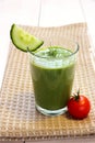 Green smoothie spinach, cucumber and small red tomato Royalty Free Stock Photo