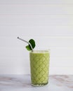 Green smoothie with straw