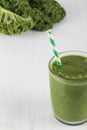 Green smoothie with straw Royalty Free Stock Photo