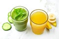 Green smoothie and yellow juice