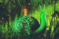 Green snail with cute robot sits on its back against night forest