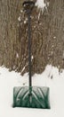 Green snow shovel