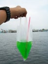 Green soda in plasticbag
