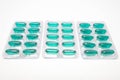 Green soft gel capsules pills in blister pack Royalty Free Stock Photo