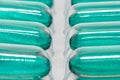 Green soft gel capsules pills in blister pack Royalty Free Stock Photo