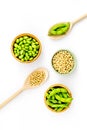 Green soybeans or edamame in spoon and bowl for fresh healthy food on white background top view Royalty Free Stock Photo