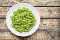 Green spaghetti pasta halloween vegetarian food holiday decoration kid party meal