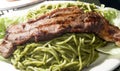 Green spaghetti tallarin saltado steak Peru