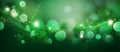 green Sparkling Lights Festive background with texture. Abstract Christmas twinkled bright bokeh defocused Royalty Free Stock Photo