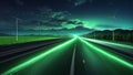 Green speed light trail on the road, renewable energy highway transportation concept