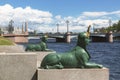 Green sphinxes at the pier on the river Malaya Nevka. Saint Petersburg,