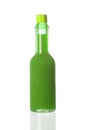 Green spicy sauce in a little bottle