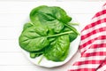Green spinach leaves on plate Royalty Free Stock Photo