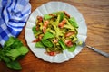 Green spinach pasta with chrispy bacon on wooden table. Gourmet italian meal Royalty Free Stock Photo