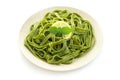 green spinach tagliatelle pasta with basil