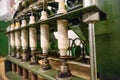 Green spindle weaving machine used to make cloth Royalty Free Stock Photo