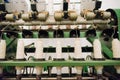 Green spindle weaving machine used to make cloth Royalty Free Stock Photo