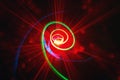 Green spiral with red rays Royalty Free Stock Photo