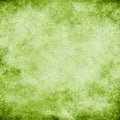 Green splatter grunge texture background. Darker edges, lighter center. Royalty Free Stock Photo