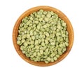 Green split peas in a wooden bowl isolated on white background. Top view Royalty Free Stock Photo