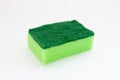 Green sponges for cleaning and washing dishes on white background Royalty Free Stock Photo