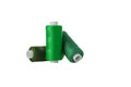 green spool of sewing thread isolated on white background Royalty Free Stock Photo