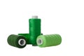 green spool of sewing thread isolated on white background Royalty Free Stock Photo