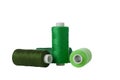 green spool of sewing thread isolated on white background Royalty Free Stock Photo