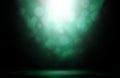 Green spotlight bokeh stage smoke night background. Royalty Free Stock Photo