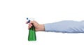 Green spray bottle in mens hand isolated on white background. Side view