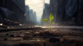 A green sprout against a blurred cityscape. A small plant Royalty Free Stock Photo