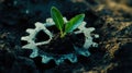 A green sprout grows from soil within a metallic gear, symbolizing eco-friendly innovation Royalty Free Stock Photo