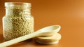 Green sprouts of raw organic buckwheat in a glass cereal jar with a wooden spoon. Vegan food concept. Organic food. The concept of Royalty Free Stock Photo